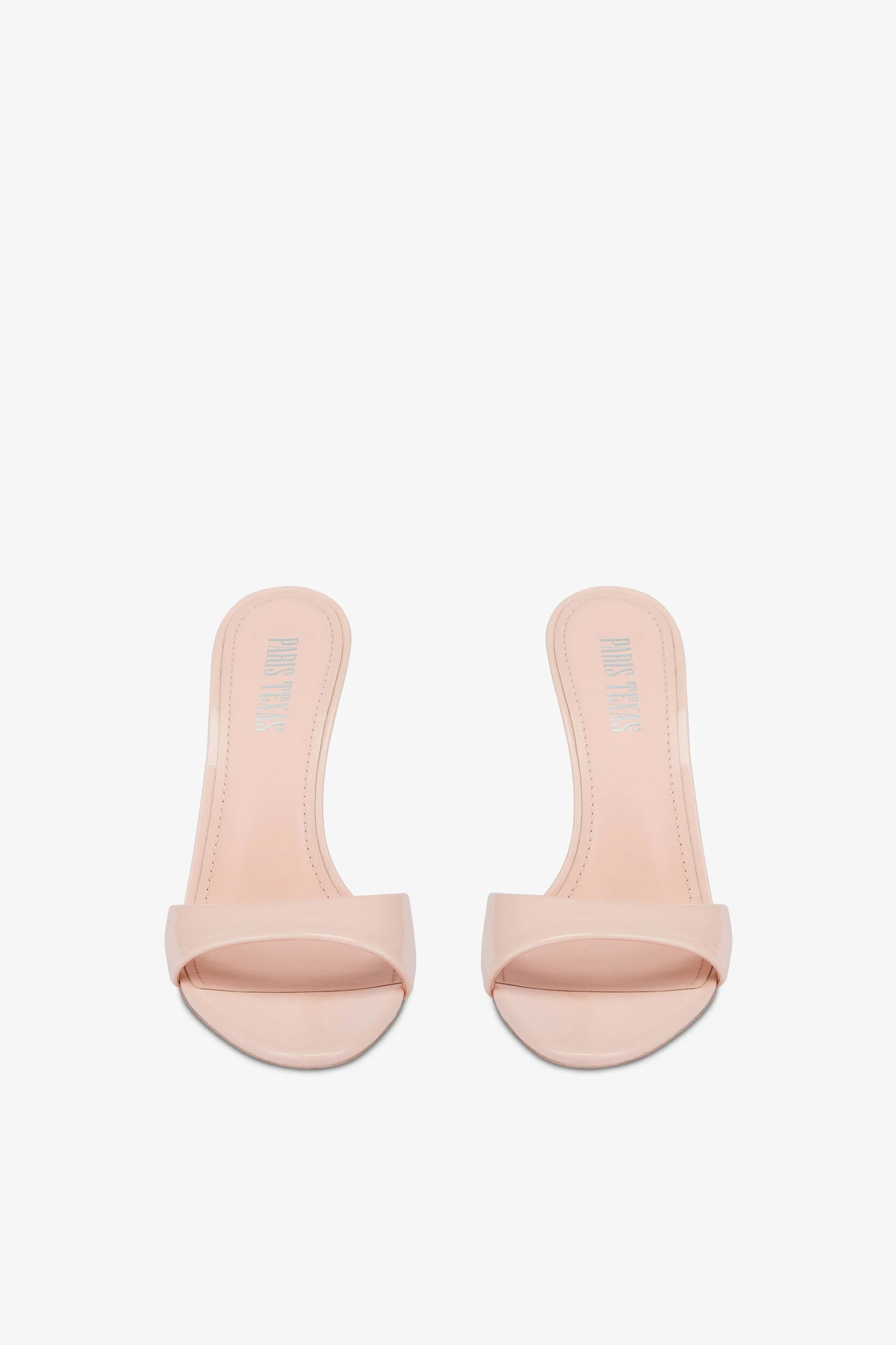 Mules in powder pink patent leather
