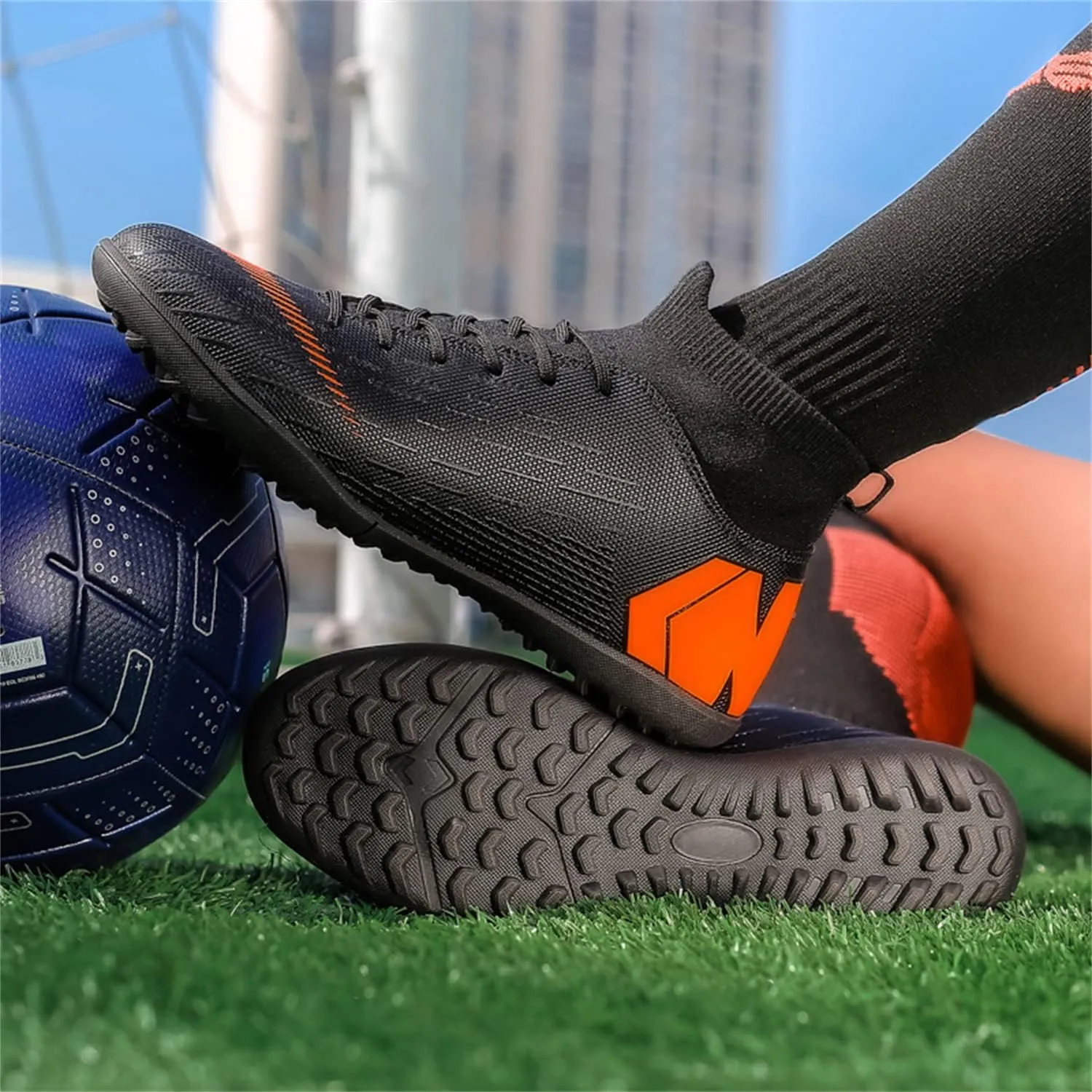 Unisex soccer sneakers are light, breathable, non-slip and shock-absorbing, and The youth high-top indoor lawn training hard bottom TF/AG.